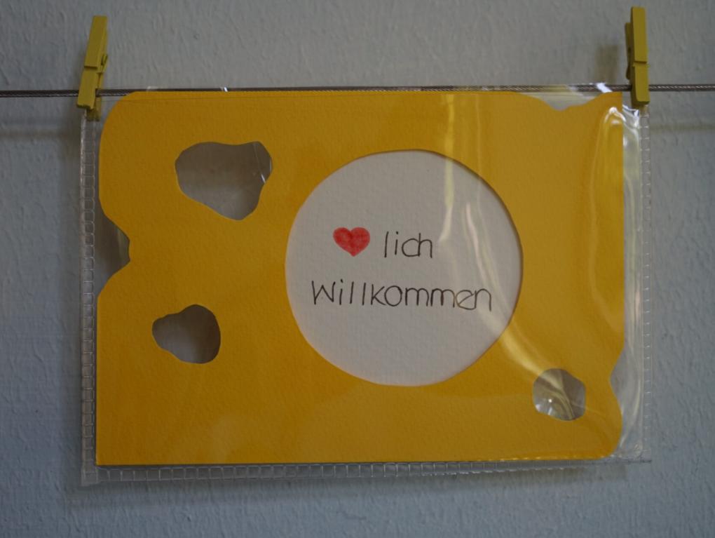 'Herzlich Willkommen' Schild