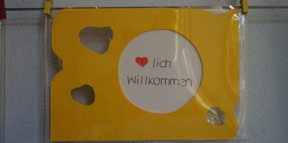 'Herzlich Willkommen' Schild