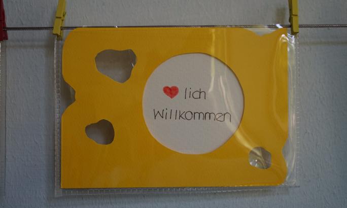 'Herzlich Willkommen' Schild